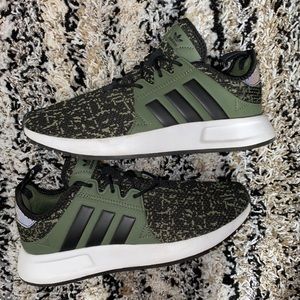 Green and black adidas
